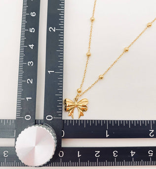 Darla-Gold Plated Stainless Steel Bow Pendant Necklace