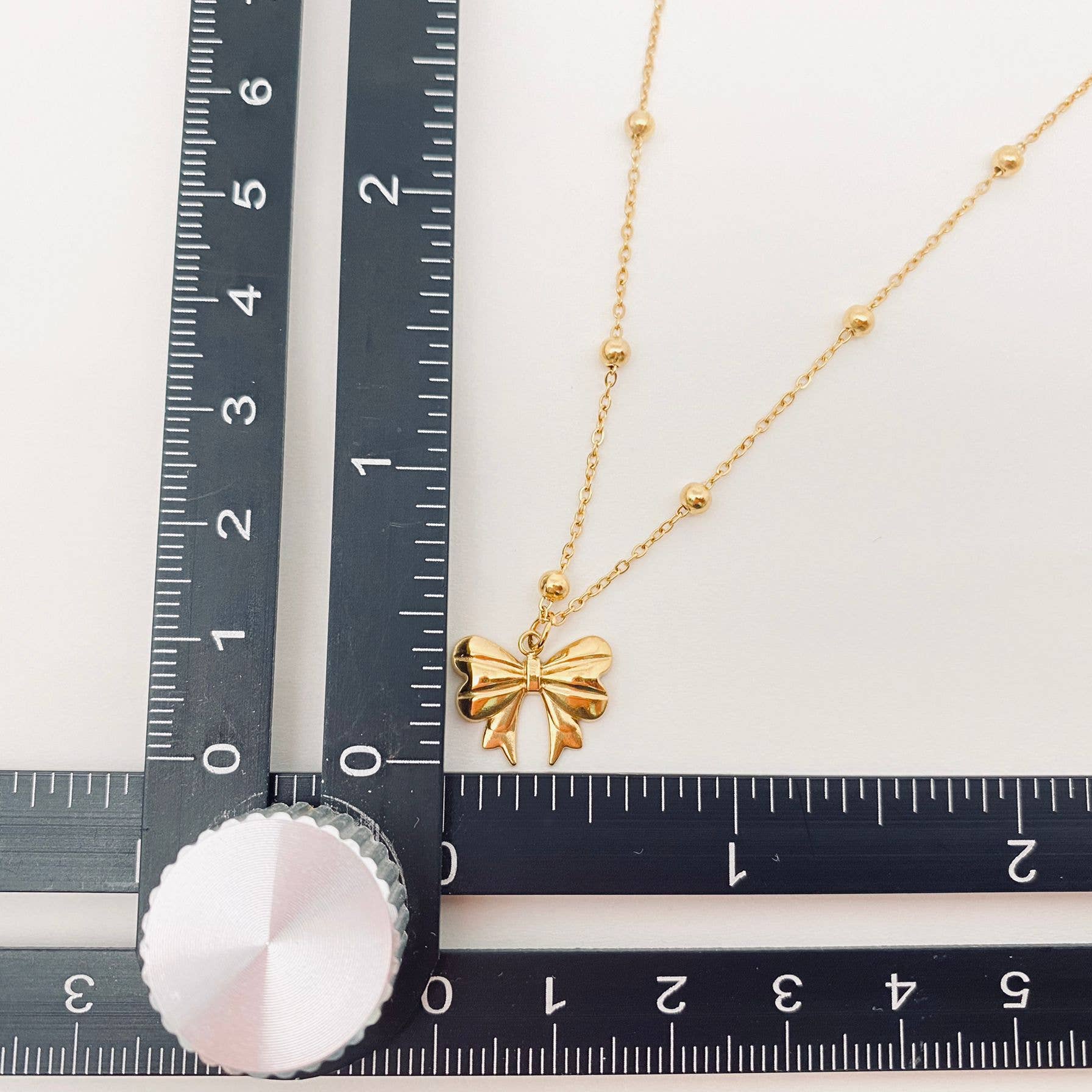 Darla-Gold Plated Stainless Steel Bow Pendant Necklace