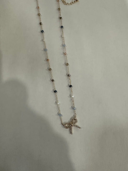 Bow Me Over beaded bow necklace