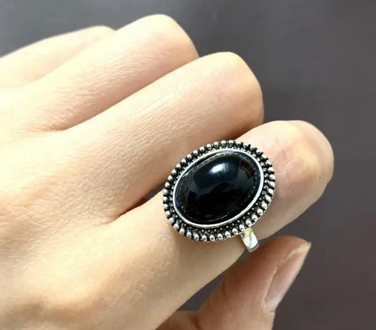 Black oval ring