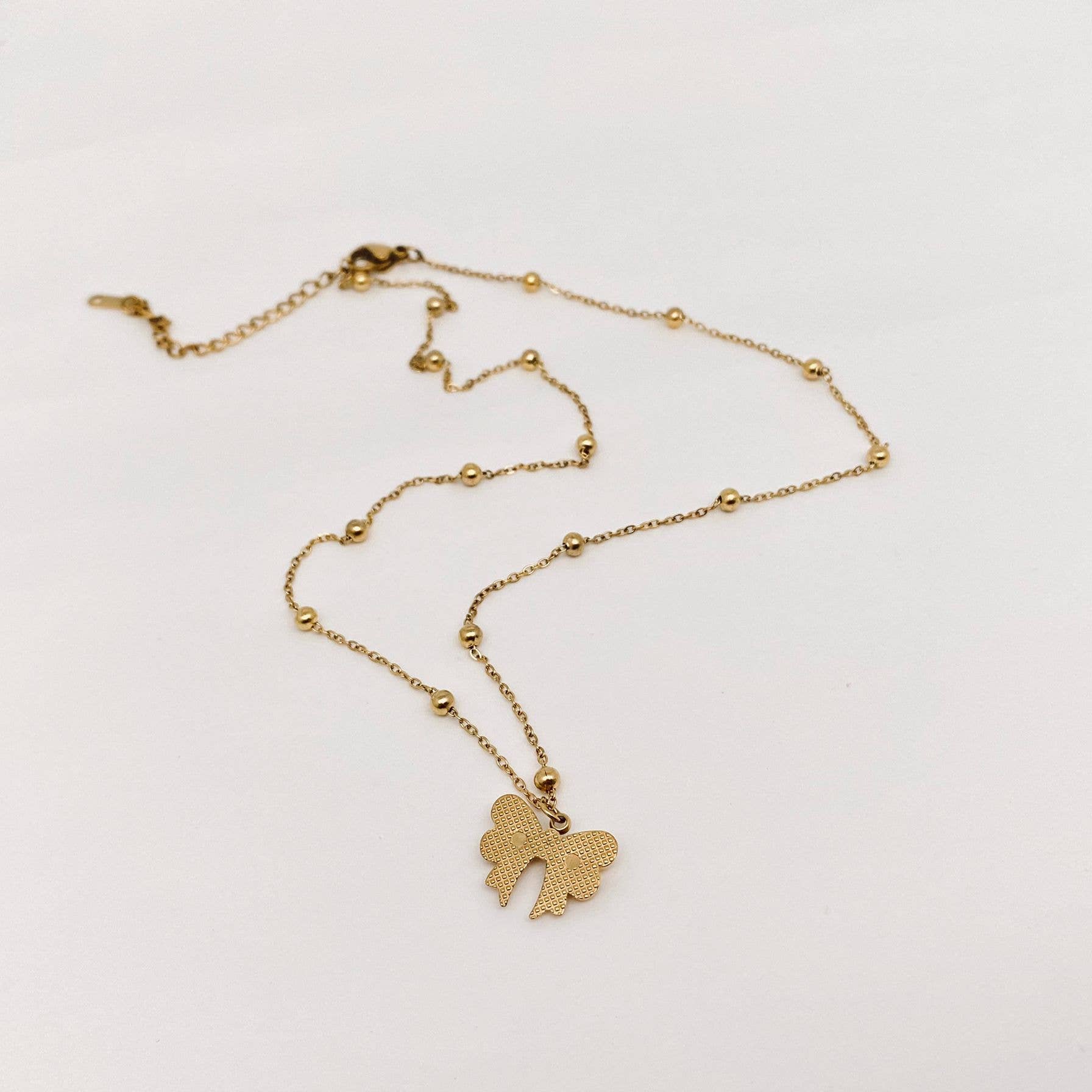Darla-Gold Plated Stainless Steel Bow Pendant Necklace