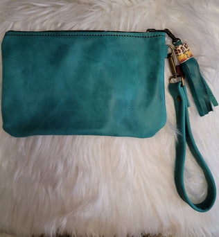 Turquoise wristlet with sunflowers