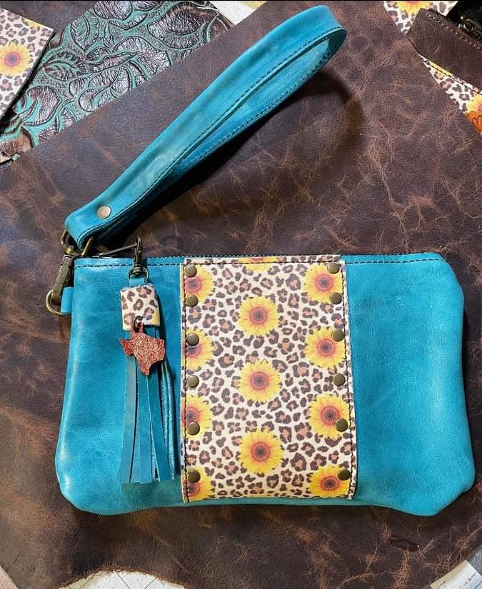 Turquoise wristlet with sunflowers